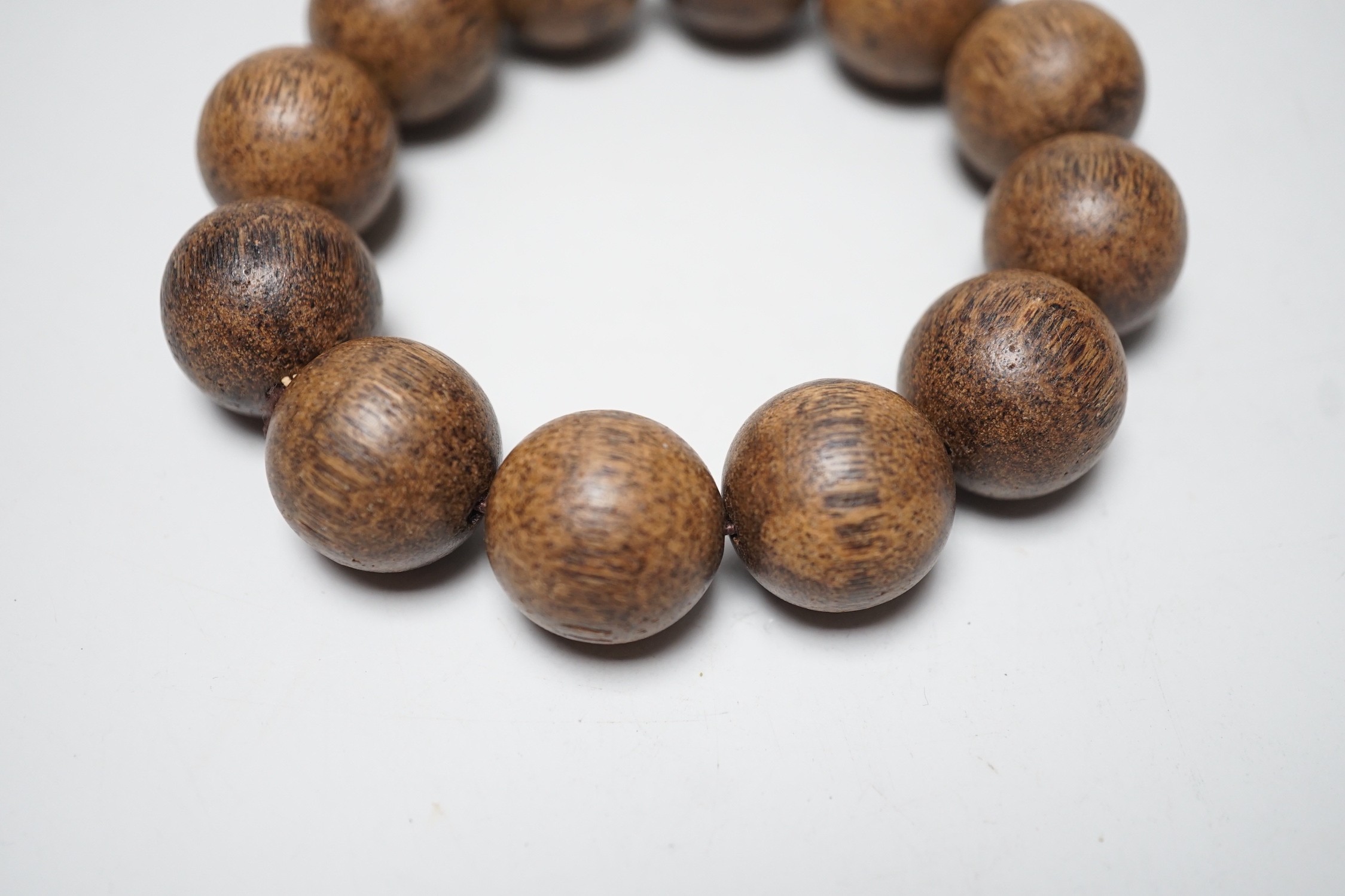 A Chinese wood bead bracelet